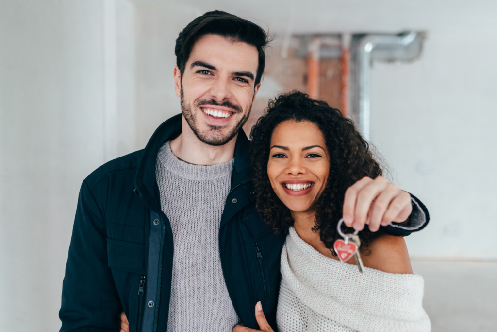 Couple holding keys